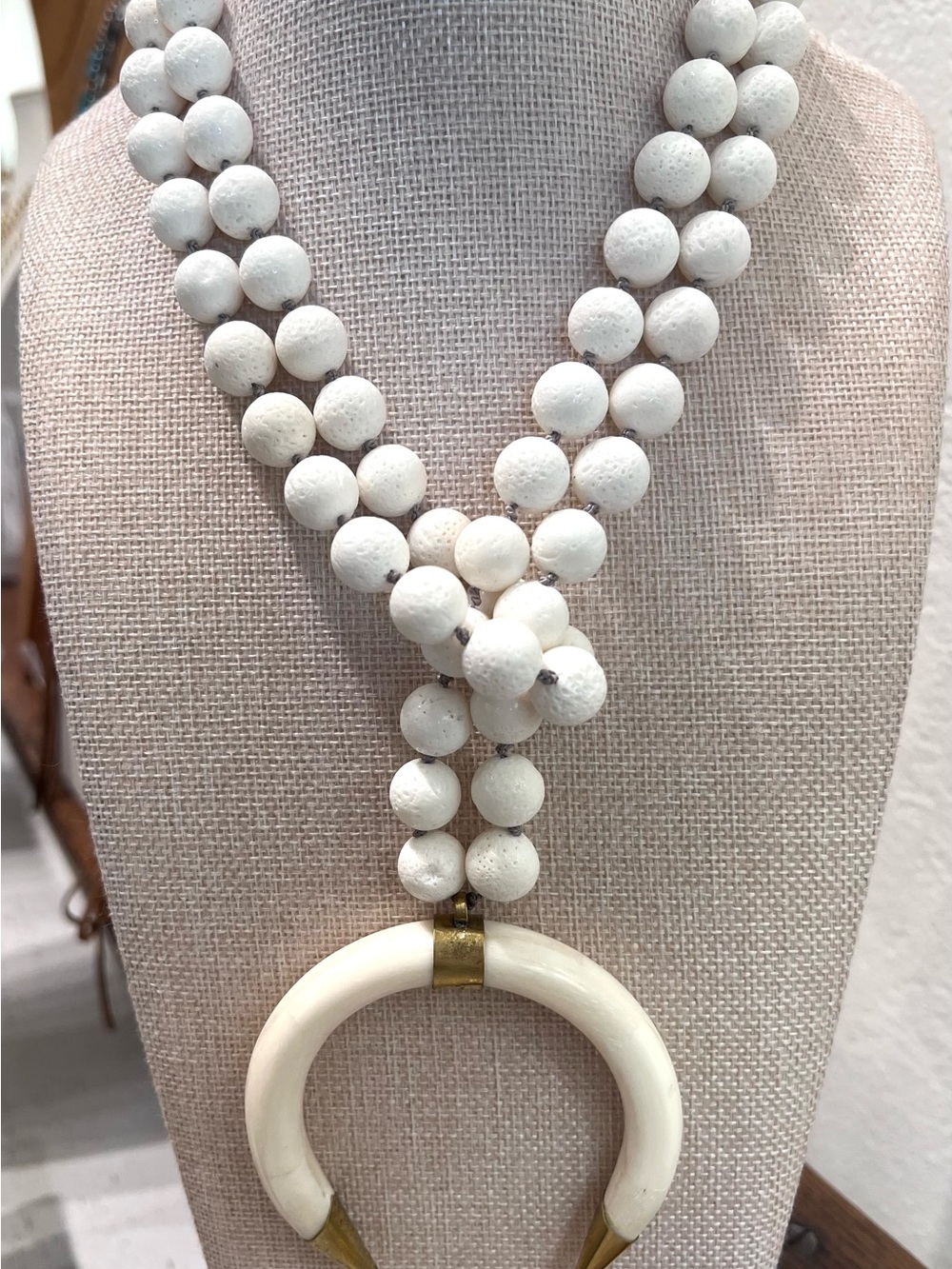 White Bone double horn with nodded faceted, white turquoise necklace. NEW